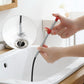 Detailed view of the drain cleaner tool's claw mechanism for grabbing stubborn clogs.