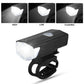LED bike headlight with USB charging cable attached.