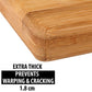 Fresh vegetables being prepared on the spacious wooden cutting board.