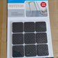 A square furniture pad clearly showing its strong adhesive backing for easy stick.
