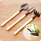 Kids Garden Tools Set of 3 pieces, including a yellow trowel, blue shovel, and green rake.