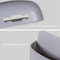 Detailed view of the wall mounted charging stand with cable slot.