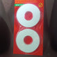 Double sided foam tape strip isolated on white background showing thickness