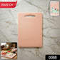 Kitchen chopping board in use with handle grip