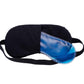 Woman relaxing with a soothing eye mask, demonstrating its use for stress relief.