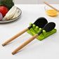 Multi-functional silicone spatula holder keeping kitchen utensils organized.