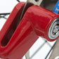 Efficient wheel lock for bike and scooter security, demonstrating compact size.