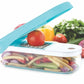 The Ganesh 7-in-1 vegetable dicer showing its sturdy base and blue exterior.