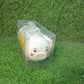 A lifestyle image showing the plastic Pig Shape Ice Mold filled with juice, ready for the freezer.
