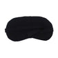 Side view of a sleep mask for travel, showing the adjustable elastic strap for a secure fit.