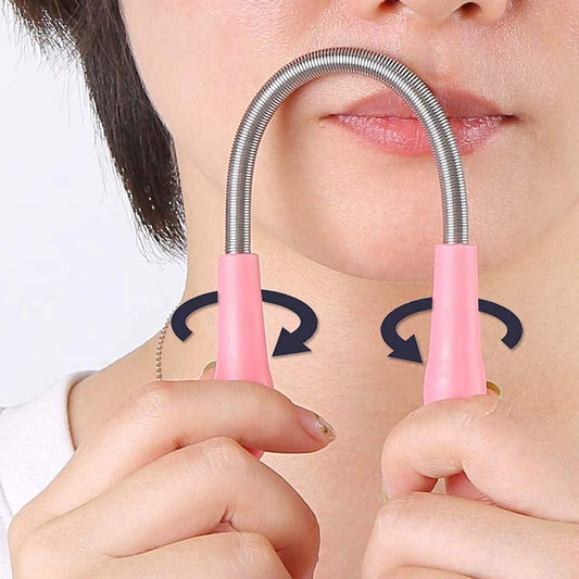 Angled view of the manual facial hair remover spring on a white background.