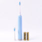 Electric sonic toothbrush on white background with extra head