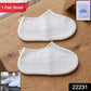 Pack of white rain shoe covers for outdoor use