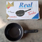Lifestyle shot of the non-stick frying pan, ready for healthy, oil-free cooking.