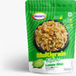 A bowl of crunchy Lemon Mint Roasted Multigrain Mixture ready for snacking.