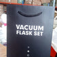 Alternative angle of stainless steel vacuum flask set showing bottle and cups