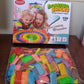 Neat stack of vibrant wooden domino blocks, ready for kids to play.