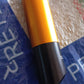 Side view of the 9 LED mini torch, showcasing its ergonomic build.