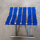 The versatile camping stool set up at a campsite, providing a convenient and comfortable seating option.