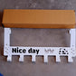 Full view of white heavy-duty over door hook hanger rack with 6 hooks