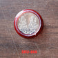 Goddess Lakshmi Pooja Coin placed on cloth background for pooja rituals