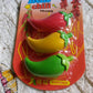 A collection of 3D chili shape erasers, showcasing the variety in the set.