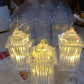 Crystal table lamp creating a cozy ambiance with its LED flickering candle light, ideal for bedrooms.