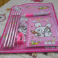 Close-up of wooden pencils, sharpener, eraser, and diary from the Kids' Stationery Kit.