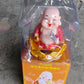 A complete view of the Solar Buddha Car Ornament, ready to adorn your car dashboard.