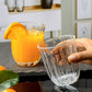 Classic clear glass tumblers with vertical ribbed finish