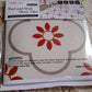 Stack of waterproof vinyl tile sticker sheets ready for home decoration projects.