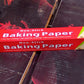 An unrolled sheet of non-stick parchment paper highlighting its length and quality.