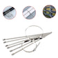 Plain background with a single stainless steel cable tie, highlighting its sleek design.