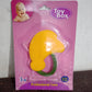 The Baby Silicone Teether placed in a freezer, indicating its freezer-safe feature for cooling relief.