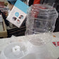 Automatic pet food dispenser with a transparent container for easy monitoring of food levels.