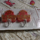 Two versatile self-adhesive hooks holding various kitchen utensils and a towel, demonstrating multipurpose use.