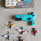 Kids enjoying the outdoor airplane gun toy, launching planes in a park.