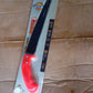 Another view of the hand pruning saw with its protective cover.