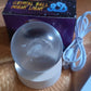 Elegant 3D Crystal Ball Lamp providing calming soft ambient light in a room.