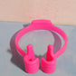 Assortment of colorful hand shape phone holders on a white background.