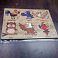 Wooden Bird Puzzle pieces laid out, ready for assembly by a young learner on the board.