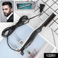 Close-up of the electric hair straightening comb's ergonomic design.