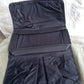 Lifestyle shot of the sofa armrest organizer keeping a living room tidy.