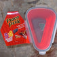 Lifestyle shot of the Tidy Table pizza storage container on a kitchen counter, ready for use.