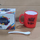 Coffee mug with unique design, includes spoon and elegant gift box.
