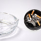 Refined round tabletop ashtray crafted from sparkling crystal glass.