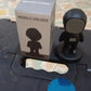 Retail packaging for the Cartoon Astronaut Magnetic Phone Holder.