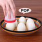 The Nonstick Egg Boiler kit with various egg preparations, highlighting its versatility.