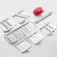 Stainless steel vegetable chopper with multiple interchangeable blades.