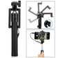 Adjustable selfie stick with aux wire securely holding a smartphone for versatile angles.